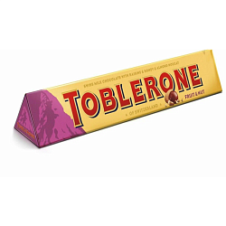 Шоколад молочный "Toblerone" 100 гр., с медово-миндальной нугой, изюмом и дробленными орехами